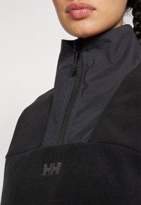 Helly Hansen DAYBREAKER CROPPED  - Pulover iz flisa - black