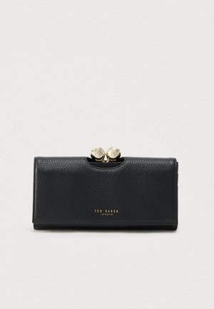 Black leather wallet with a textured finish, gold-tone clasp hardware at the top, and embossed brand name on the front.