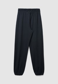 Schwarze Jogginghose mit elastischem Bund, schmal zulaufenden Bündchen und Seitentaschen. Angenehme Textur und lässiges Design, geeignet für entspannte Freizeit.