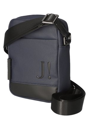 Navy blue crossbody bag made of textured fabric, featuring a sleek design, black leather bottom, adjustable strap, and embossed logo.
