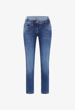 Blå denim skinny jeans med två knappar, fickor fram och bak samt subtil blekning på lår och knän.