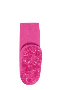 Bright pink baby sock with textured, non-slip rubber sole pattern for grip and safety.