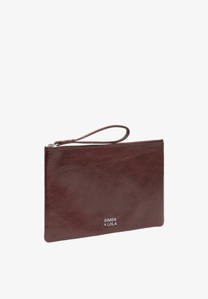 Brown leather wristlet clutch with zipper closure and wrist strap, featuring silver "Bimba y Lola" logo on front.