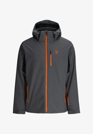 Giacca grigia resistente all'acqua con cappuccio regolabile, zip arancioni e logo di un ragno. Presenta tasche laterali e polsini elasticizzati per una vestibilità sicura.