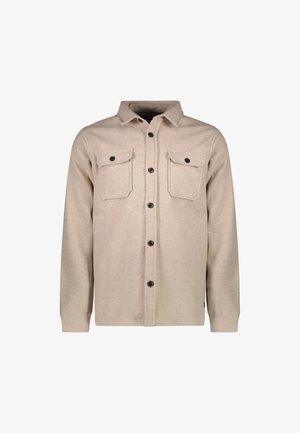 Beige knoopshirt gemaakt van zachte stof, met twee borstzakken, zwarte knopen en een klassiek kraagontwerp.