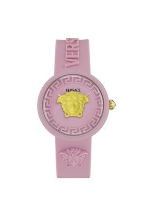 Roza gumijasta ura z okroglo površino, na kateri je zasnovana rumena Meduza, zlati kazalci in grški vzorec, s podpisom "VERSACE".