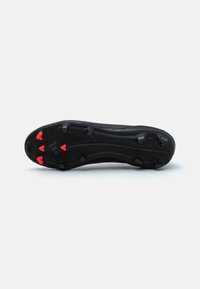Black football cleat with a smooth, textured sole. Features red studs for traction and subtle branding on the side.