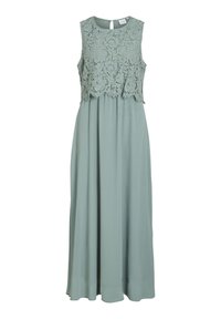 Robe sans manches avec un haut en dentelle vert clair, menant à une jupe fluide en tissu texturé uni dans une teinte de vert complémentaire.