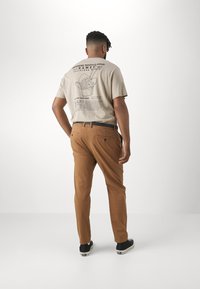 Jack's Sportswear SUPERFLEX PANTS - Chino hlače - burnt brown