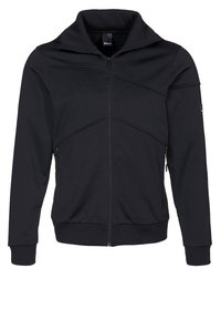 Czarna kurtka zapinana na zamek z wysokim kołnierzem, teksturowaną tkaniną, skośnymi szwami dla efektu designu oraz bocznymi kieszeniami. Prosty i nowoczesny sportowy styl.