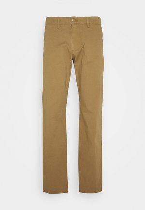 Khaki chinos with a straight fit, crafted from smooth cotton fabric. Features a zip fly, button closure, and minimal stitching detail.