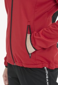 Endurance ZORA - Soft shell jacket - chinese red