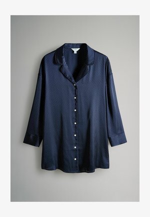 Hedvábná košile s námořnickými modrými puntíky, vyrobená z hladké tkaniny, se zapínáním na knoflíky, výstřihem s klopami a rukávy do tří čtvrtin.