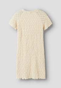 Robe de couleur crème avec un motif floral texturé, à manches raglan courtes et ourlet en dentelle. Tissu léger avec une coupe ample.