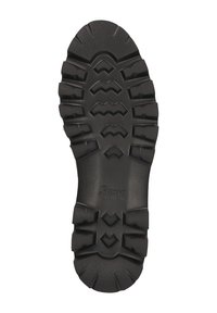 Schwarze Bootsohle mit tiefen Profilen, robustem Muster für Grip und dem eingprägten Markennamen "Sioux" in der Mitte.