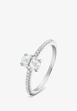 Weißgoldring mit einem oval geschliffenen mittleren Diamanten und einem mit kleinen runden Diamanten verzierten Ringband.