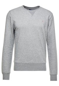 Světle šedá mikina s kulatým výstřihem, dlouhými rukávy, pružnými manžetami a lemem, a malým vyšitým logem na levé hrudi.