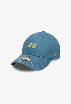 Blue baseball cap with gold "46" embroidery on front, small logo on side, and repeated white "VR46" text on curved brim.