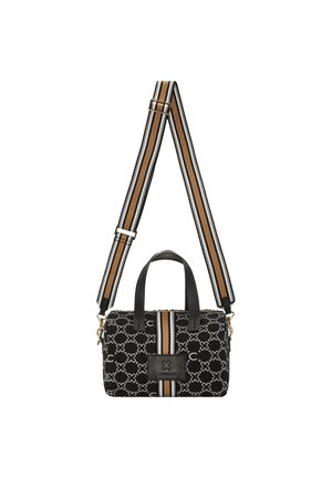 Black crossbody bag with white geometric pattern, brown and white striped adjustable shoulder strap, and two black handles.