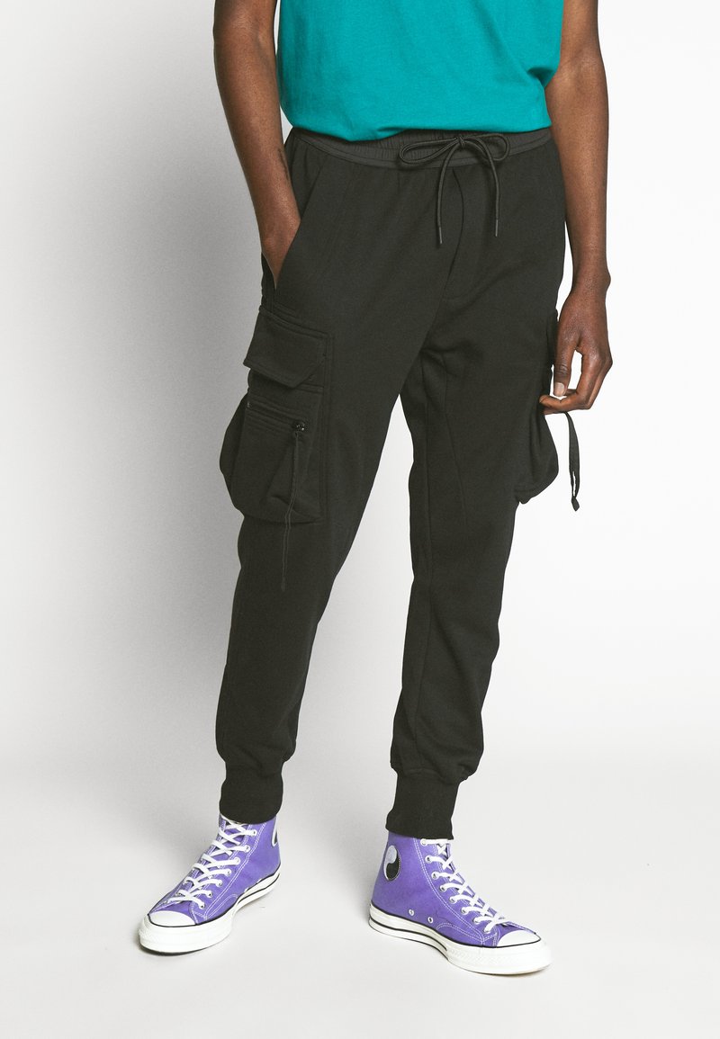 Urban Classics TACTICAL PANTS - Reisitaskuhousut - black