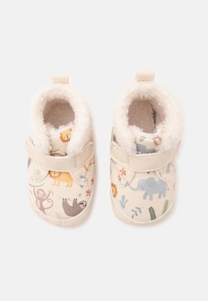 Bløde beige babysko med dyreprint, herunder løve, abe, dovendyr og elefant, foret med blødt hvidt stof og lukning med rem.
