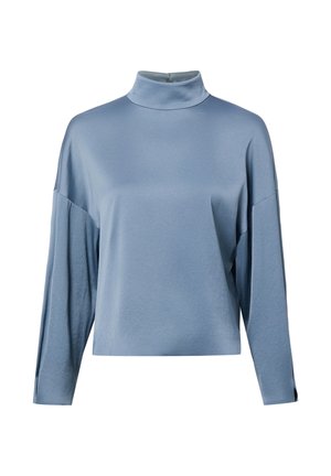 Lichtblauw topje met lange mouwen, een hoge hals en een losse pasvorm, met afgezakte schouders en een licht cropped lengte.