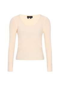 Langärmliges, geripptes Oberteil in hellbeige, mit Rundhalsausschnitt und figurbetontem Schnitt. Weiches, dehnbares Material mit gleichmäßiger Struktur.