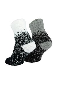Flauschige Knöchelsocken in Schwarz, Weiß und Grau. Farbverlauf-Muster mit einem dicken, strukturierten Strick und einem weichen, plüschigen Bündchen oben.