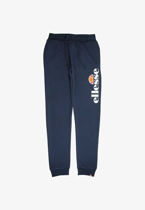 Pantalon de survêtement bleu marine en mélange de coton doux, avec taille élastique et cordon de serrage, poignets côtelés, et logo blanc « ellesse » sur le côté.