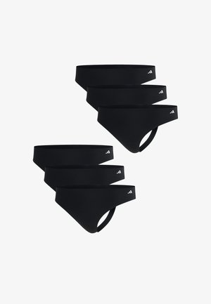 Sort ribbet tanktop med brede stropper og logoakcent, parret med matchende sorte bikiniunderdele. Enkel, sømløs design og pasform.