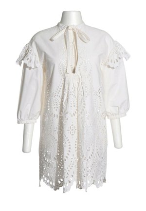 White cotton dress with eyelet embroidery, three-quarter puff sleeves with lace cut-outs, and a tie closure at the round neckline.