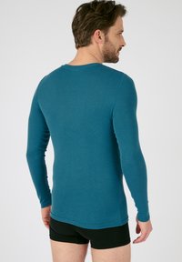Damart COL V FINE SENSITIVE MANCHES LONGUES - Maglietta intima - bleu pétrole