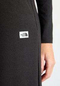 The North Face WIDE LEG JOGGER - Treniņtērpa apakšdaļas - black