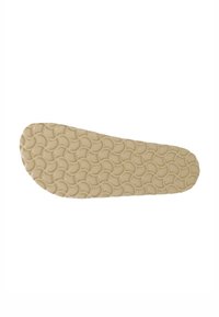 Intersuola di scarpa beige con un motivo testurizzato di cerchi rialzati, dalla forma curva ed allungata progettata per il comfort del piede.
