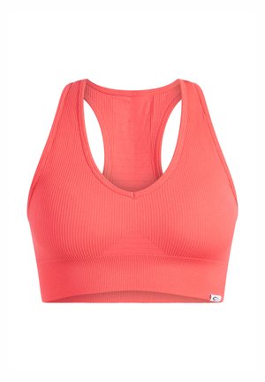 Coral sports bra with a ribbed texture, racerback design, and a wide band. Features a triangular accent in the front for added detail.