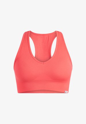 Coral sports bra with a ribbed texture, racerback design, and a wide band. Features a triangular accent in the front for added detail.