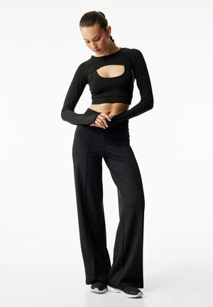 Koton, FLARED - Housut - black