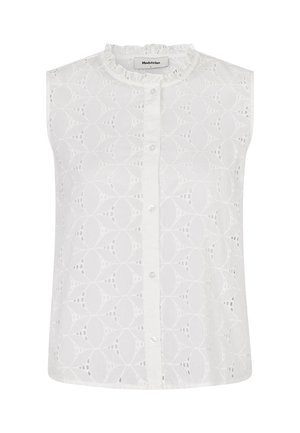 White sleeveless blouse featuring a textured embroidered pattern with circular motifs and a ruffled neckline, secured by front buttons.