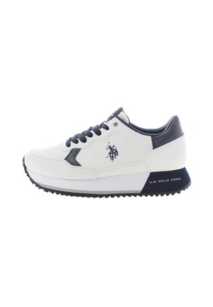 White leather sneaker with navy accents, round toe, lace-up design, logo on side, textured rubber sole, and layered sole structure.