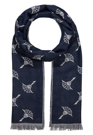 Écharpe bleu foncé avec motif de fleur de chardon blanc et bords effilochés, pliée en boucle lâche.