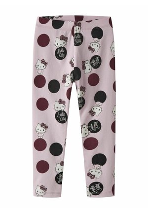 Różowe legginsy z powtarzającym się wzorem Hello Kitty, ozdobione czarnymi i bordowymi okręgami oraz tekstem w zabawnym kroju pisma.