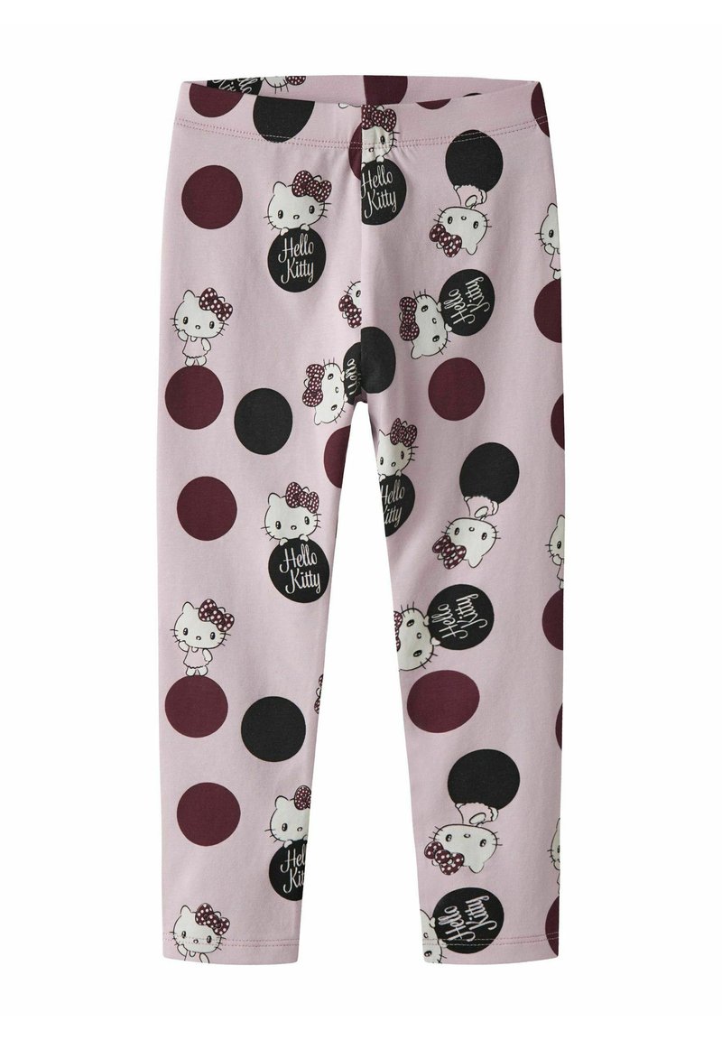 Różowe legginsy z powtarzającym się wzorem Hello Kitty, ozdobione czarnymi i bordowymi okręgami oraz tekstem w zabawnym kroju pisma.