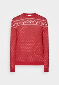 Maglione rosso lavorato a maglia con un motivo di renna bianca sullo scollo, con piccoli punti bianchi su tutta la superficie. Collo e polsini a coste.