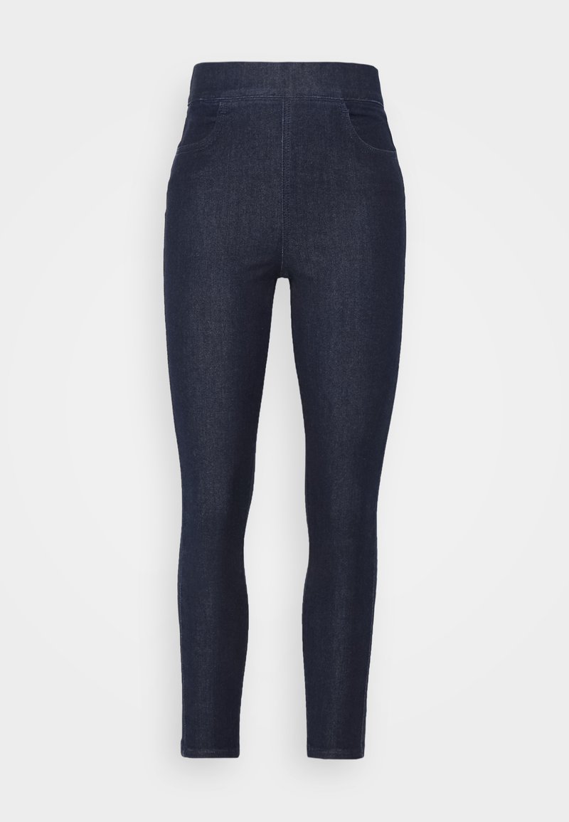 Leggings de denim escuro com cintura alta, apresentando dois bolsos frontais e um corte justo, exibindo uma textura suave e detalhes de costura mínimas.