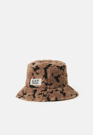 Brown and black textured bucket hat with a fabric patch labeled "EA7 Emporio Armani" on the side against a plain white background.