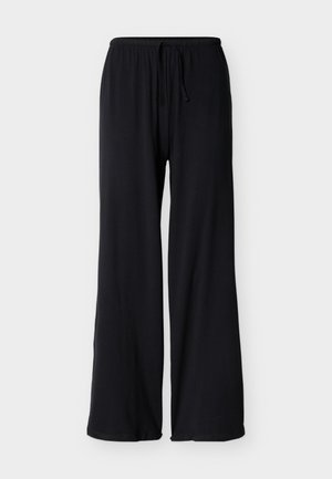 Pantalon noir à coupe ample en tissu lisse, avec une taille élastique munie d'un cordon de serrage et des jambes larges.