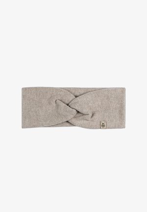 Knit headband in a light beige color with a twisted design at the front and a small branded tag on the side. Smooth texture.