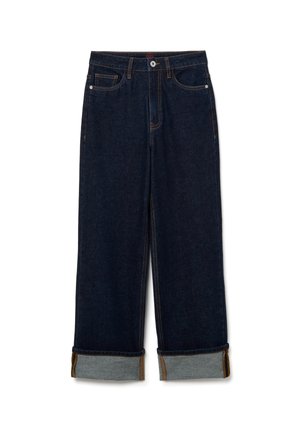 Jean en denim bleu foncé avec une coupe droite, ourlets retroussés présentant une couche intérieure bleu clair contrastante et des accents de couture orange.