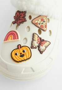 Next Hausschuh - neutral pumpkin badge