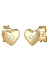 Goldene herzförmige Ohrringe mit polierter Oberfläche, die in der Mitte jedes Ohrrings einen einzelnen runden Diamanten aufweisen.